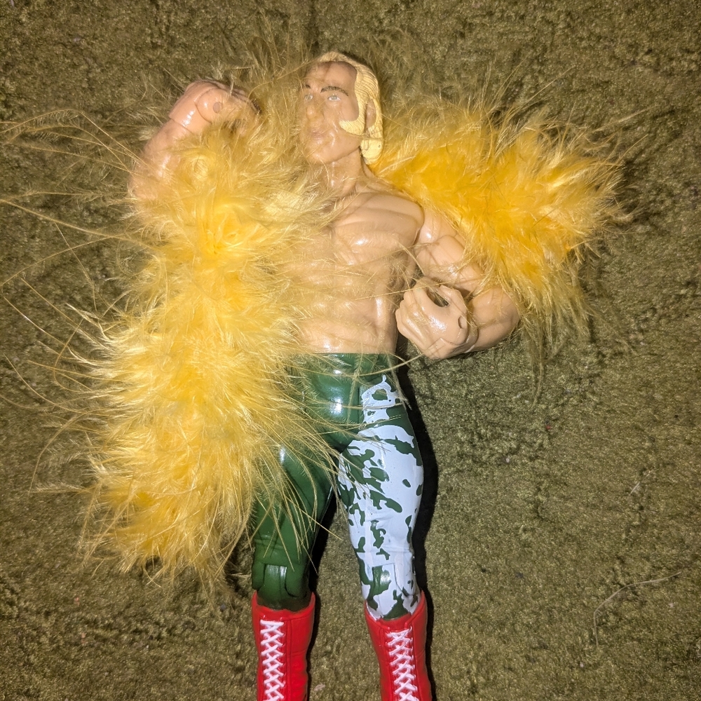 Superstar I Action Figure with Yellow Feather Boa